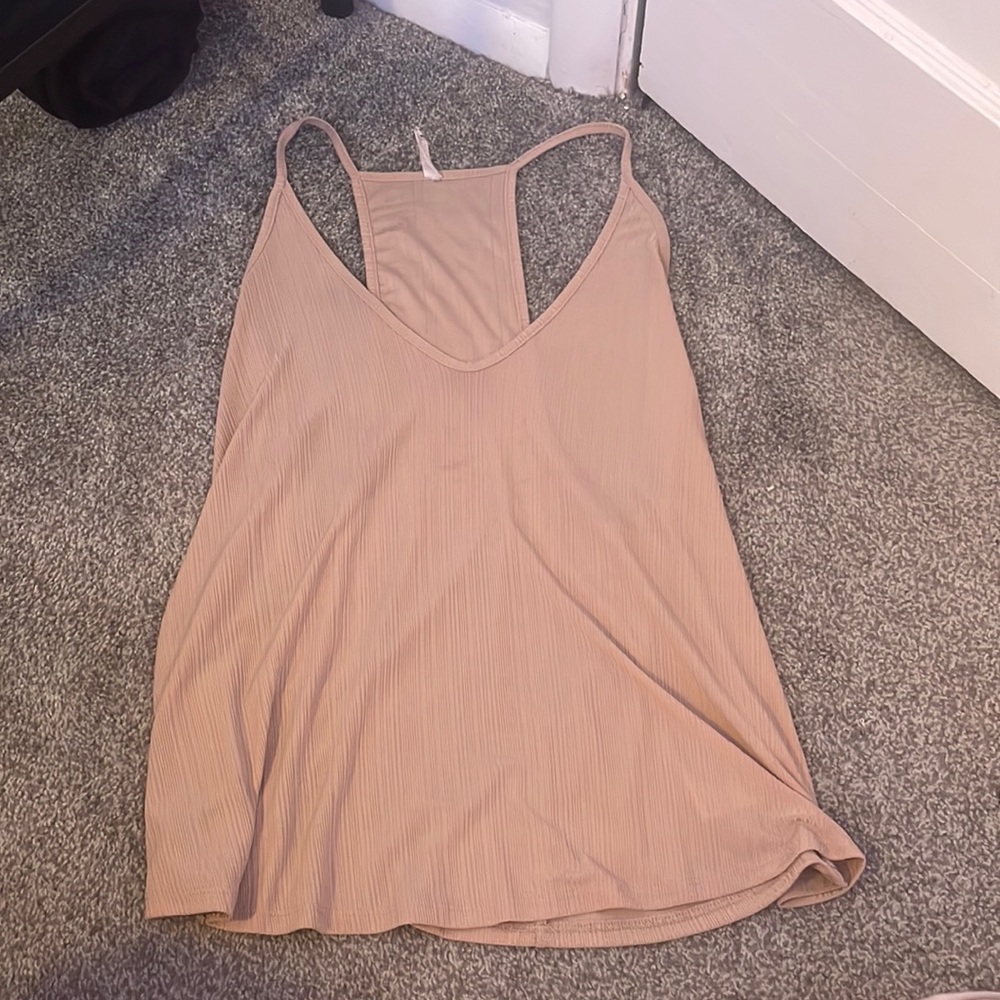 Loose-fitting pink free people tank